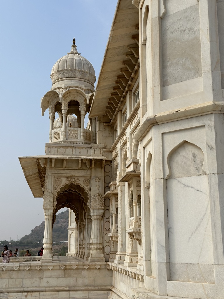 White marble palace balcony and domed tower