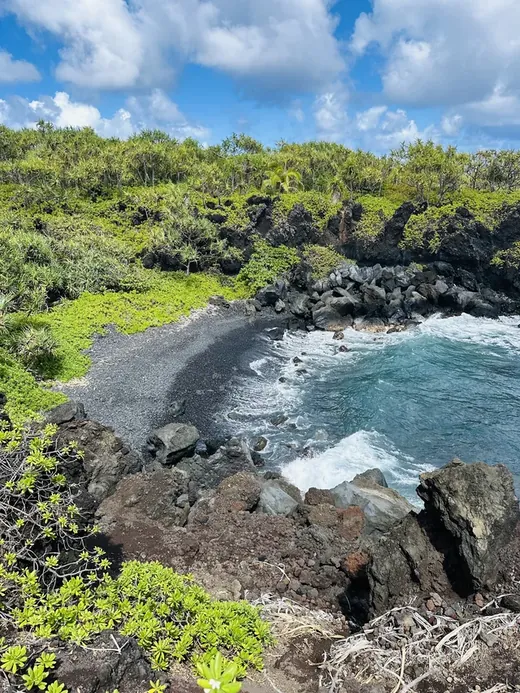 Hawaii route: green volcanic cliffs above the ocean
