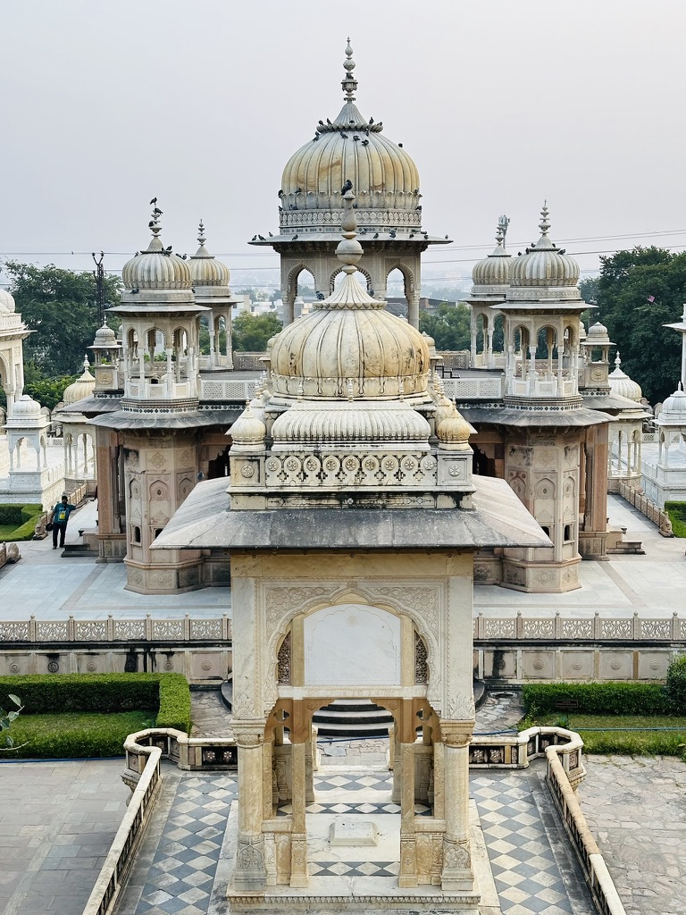 Symmetrical view across ornate domed cenotaphs
